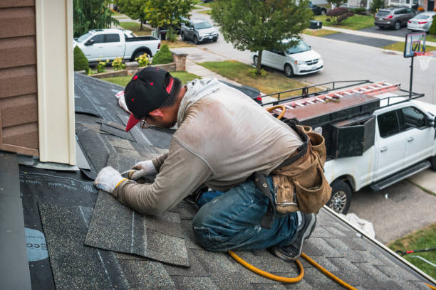 Professional Roof Leak Repair technician working in Cadillac, MI
